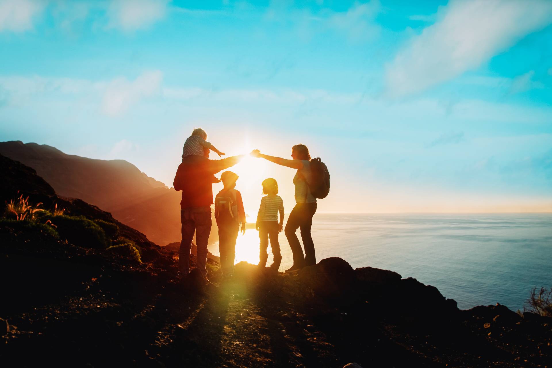 family hike on top of a mountain