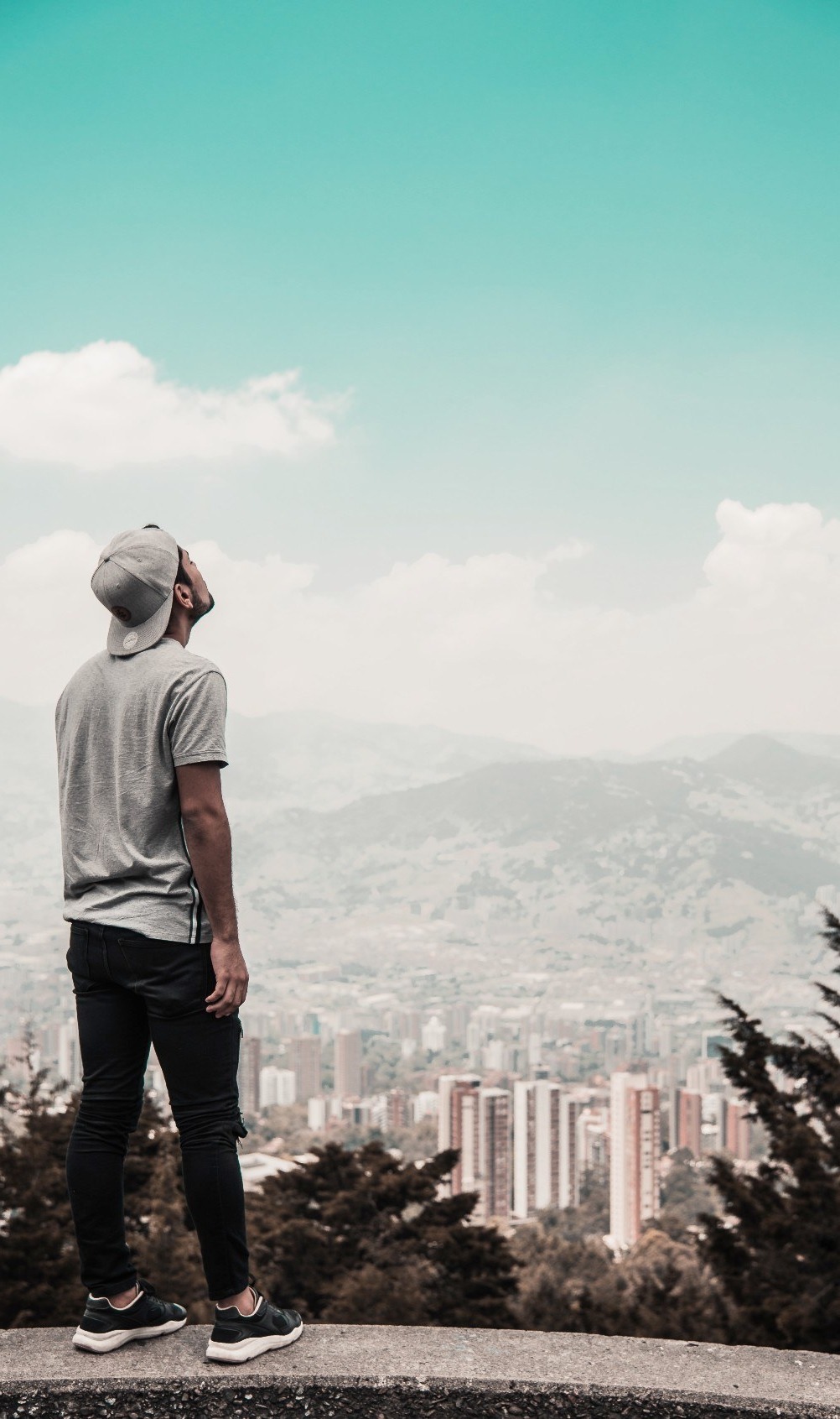 man looking up to the sky