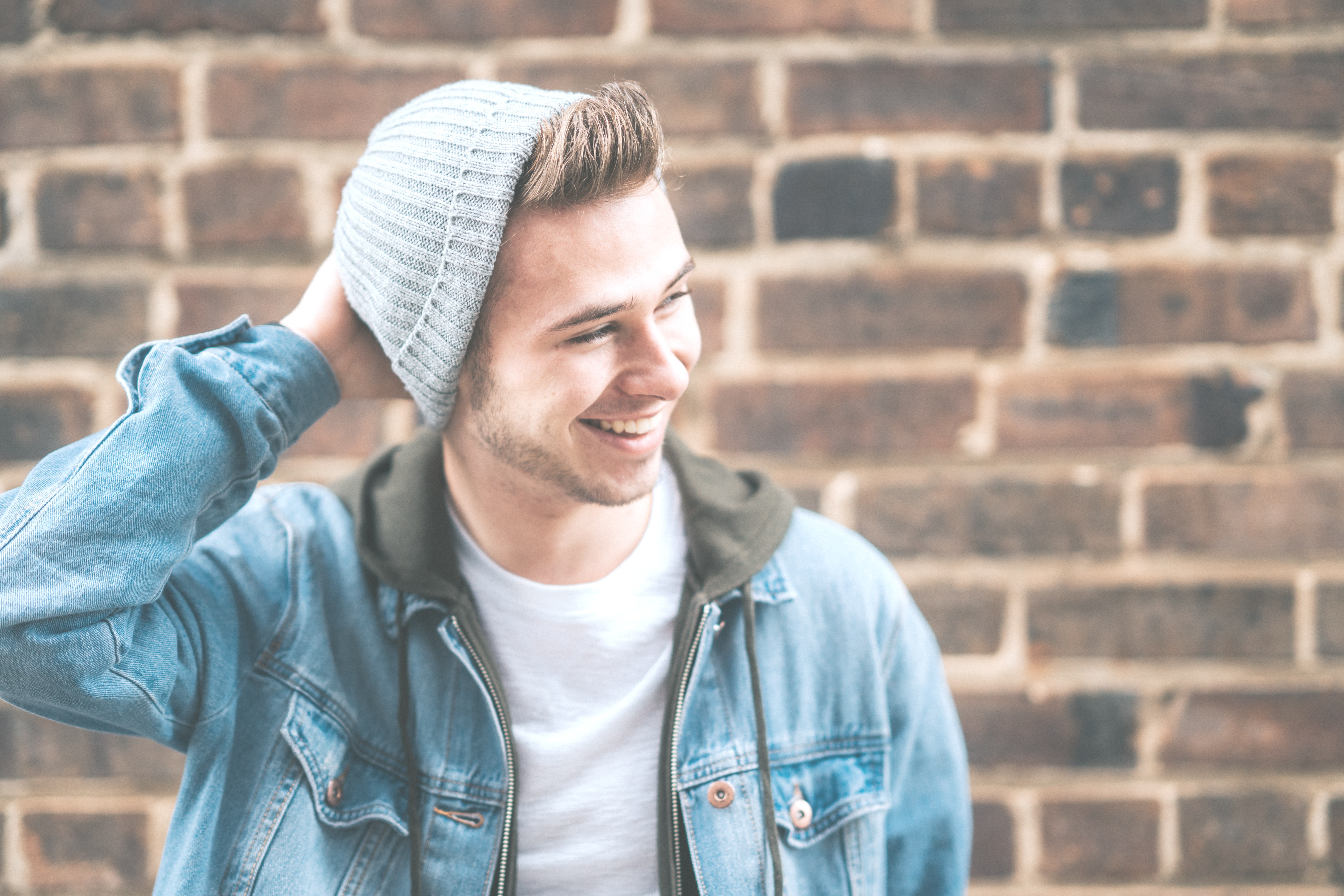 smiling man in winter cap
